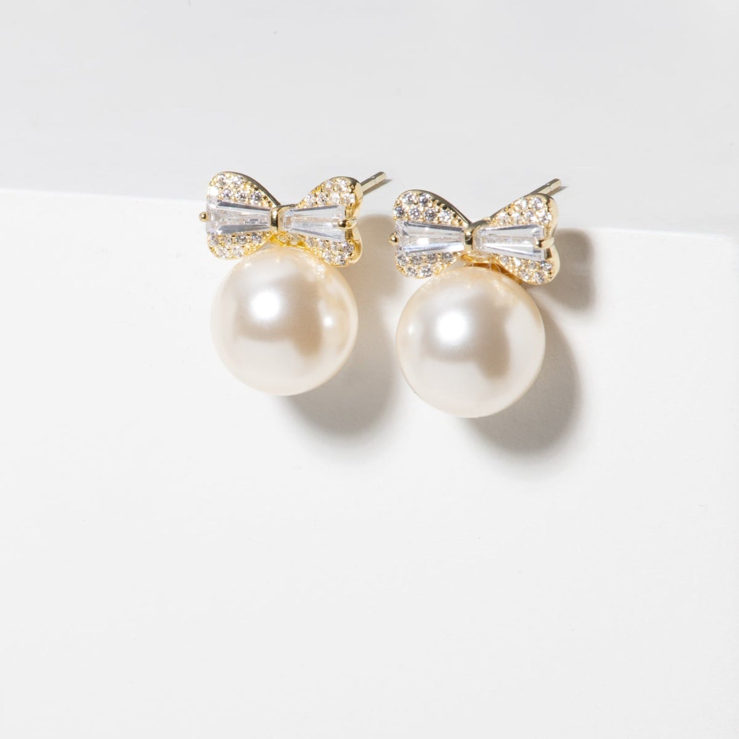 Vegan Pearl Bow Stud Earrings